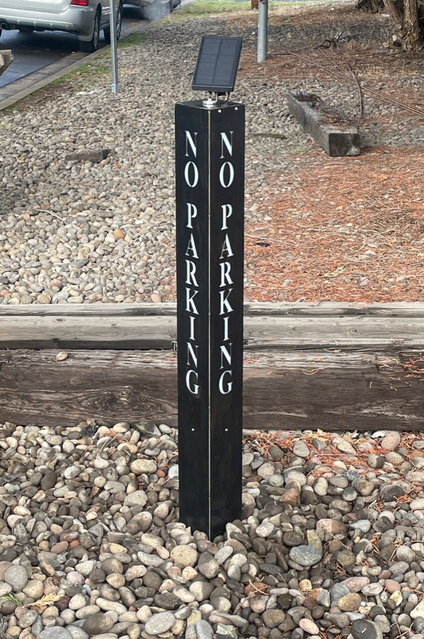 43" Tall Steel No Parking sign, Solar Powered LED lighted.